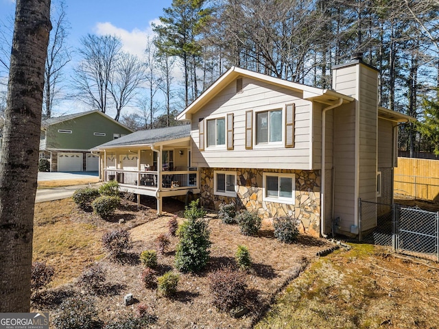 view of front of home with a garage and covered porch