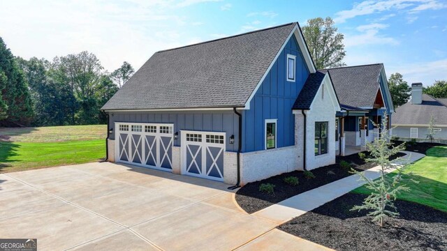 garage with a yard