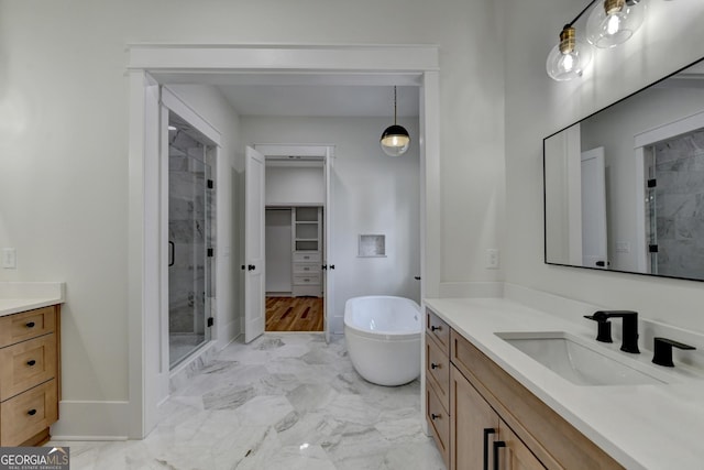 bathroom with plus walk in shower and vanity