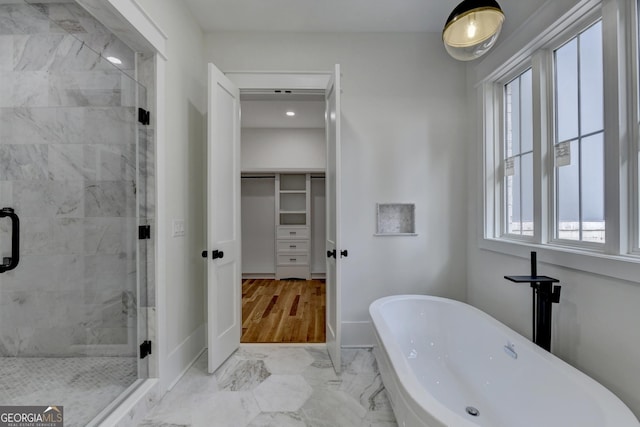 bathroom featuring plus walk in shower