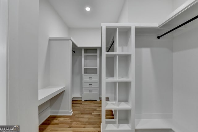 spacious closet with light wood-type flooring