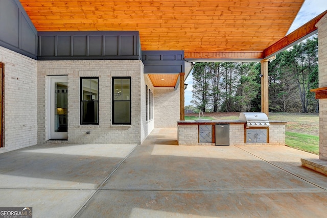 view of patio featuring area for grilling and grilling area