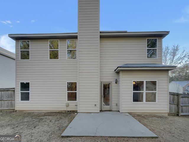 back of house featuring a patio