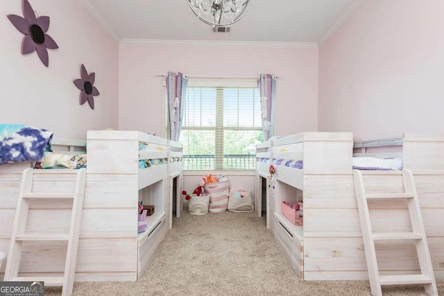 carpeted bedroom featuring a notable chandelier and crown molding