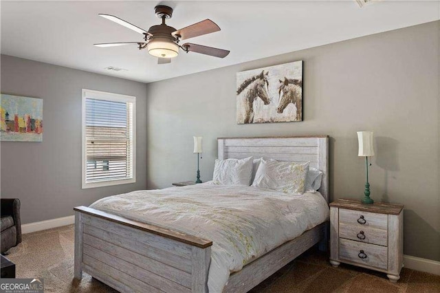 carpeted bedroom with ceiling fan