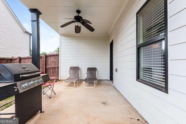 view of patio / terrace with a grill and ceiling fan