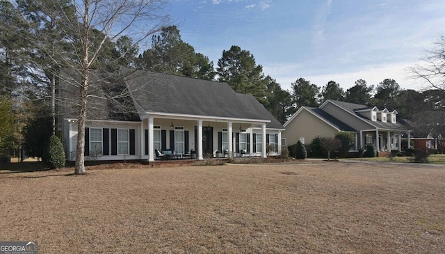 cape cod home with covered porch