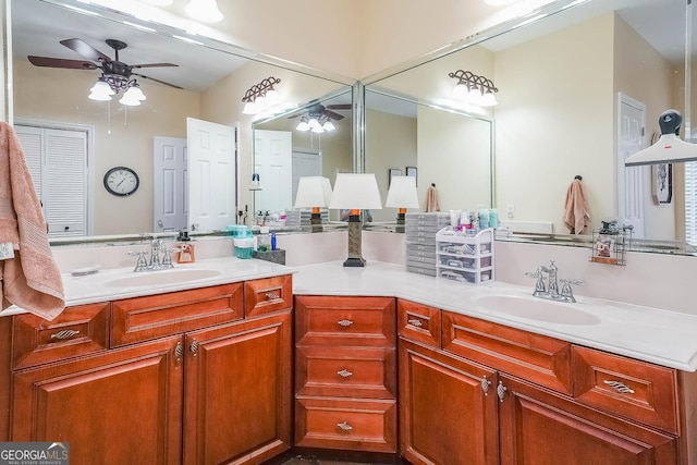 bathroom with ceiling fan and vanity