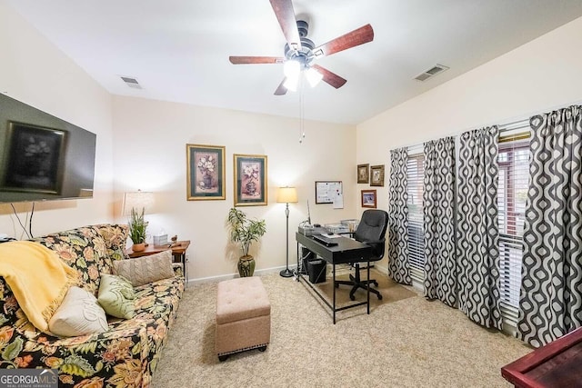 home office with carpet flooring and ceiling fan