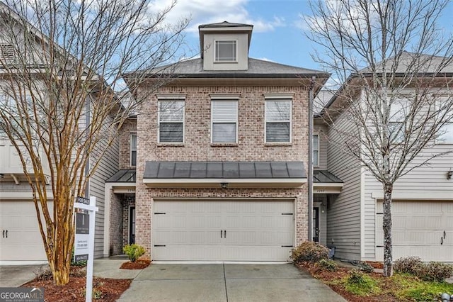 view of front of home with a garage