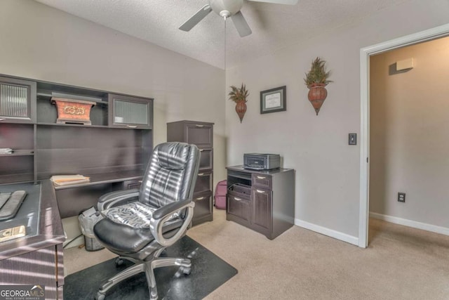 office with light carpet, a textured ceiling, and ceiling fan