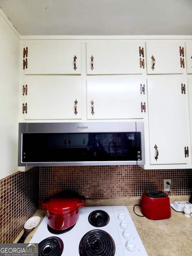 room details featuring white cabinetry