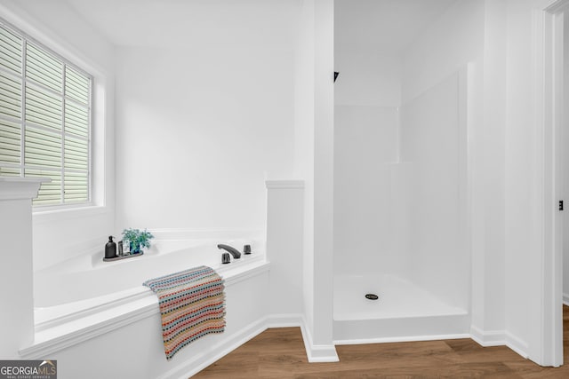 bathroom with hardwood / wood-style flooring