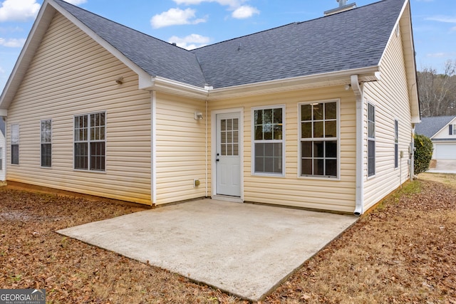 back of property featuring a patio area