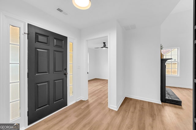 foyer entrance featuring light hardwood / wood-style flooring