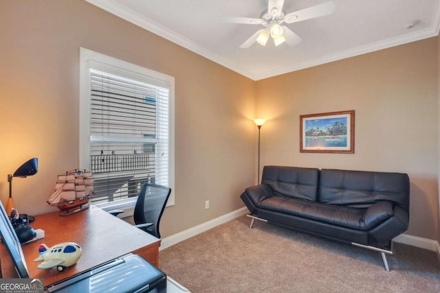 office featuring carpet floors, ornamental molding, and ceiling fan