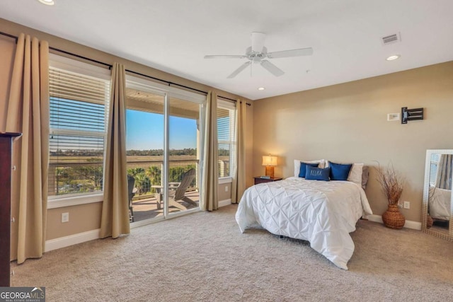 carpeted bedroom with access to exterior and ceiling fan