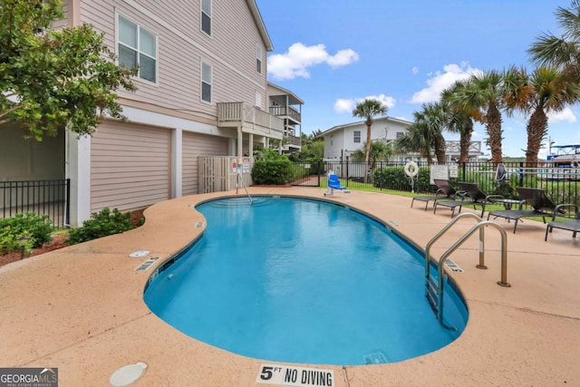 view of pool featuring a patio area