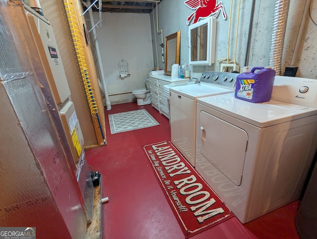 laundry room with washer and dryer