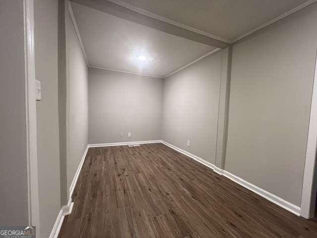 additional living space featuring dark hardwood / wood-style flooring