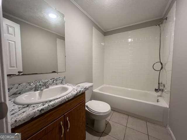 full bathroom with tile patterned flooring, ornamental molding, vanity, toilet, and bathing tub / shower combination