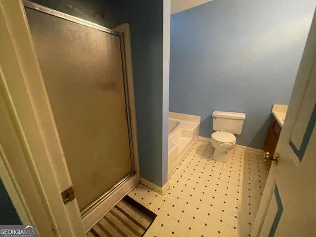 bathroom with shower with separate bathtub and toilet