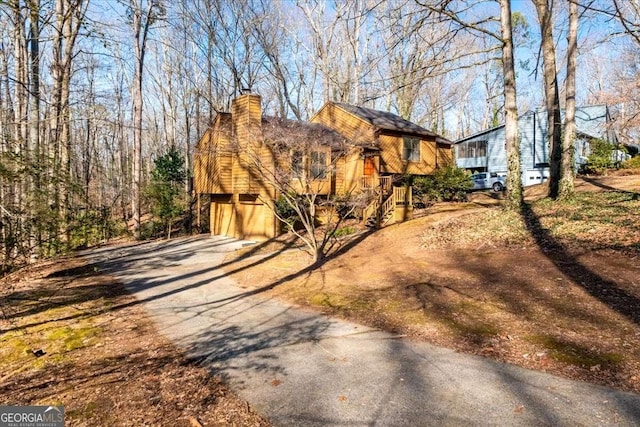 view of front of property with a garage