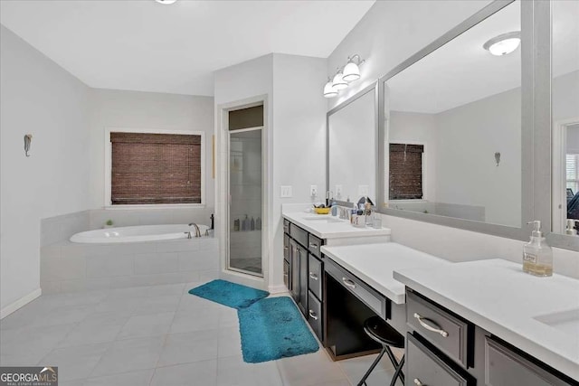 bathroom featuring vanity, tile patterned floors, and plus walk in shower