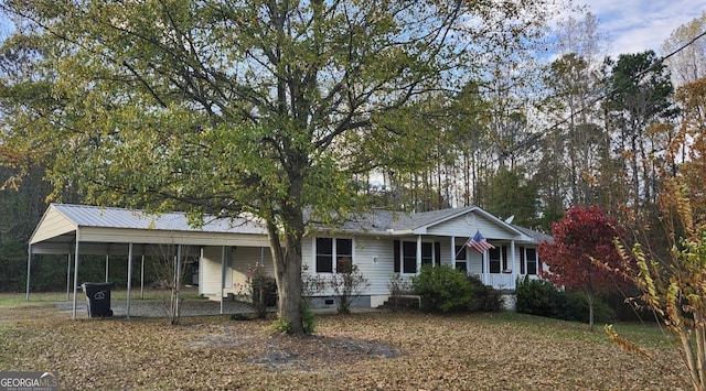 ranch-style house with a carport