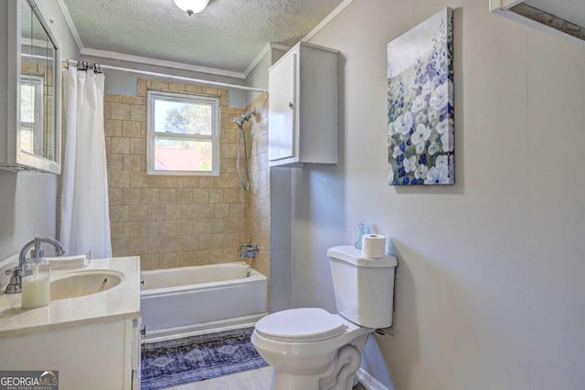 full bathroom featuring crown molding, vanity, a textured ceiling, toilet, and shower / bath combo with shower curtain