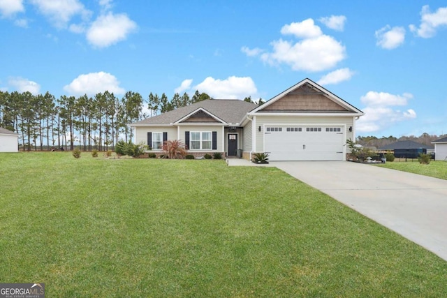 view of front facade featuring a garage and a front yard