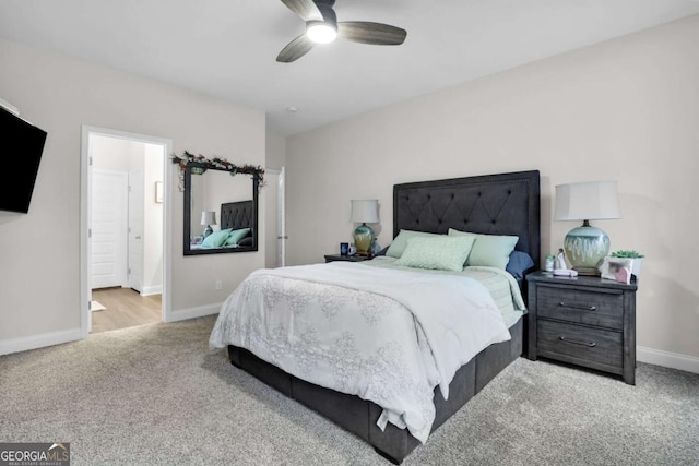 bedroom featuring ceiling fan and light colored carpet