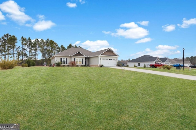 ranch-style home with a garage and a front yard