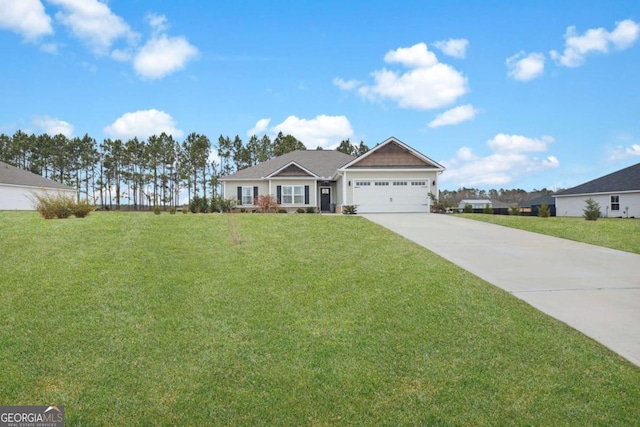 view of front of house featuring a garage and a front yard