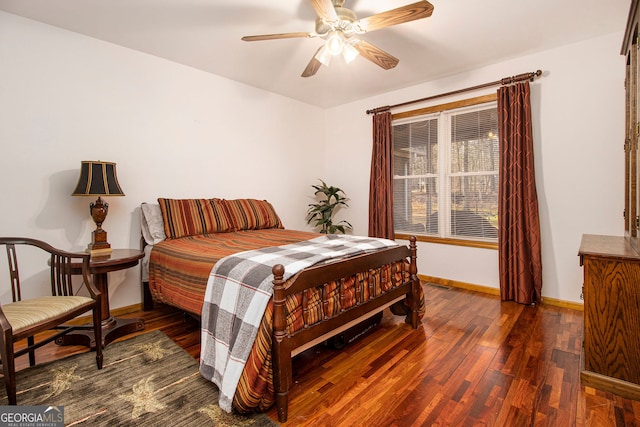 bedroom featuring dark wood-type flooring and ceiling fan