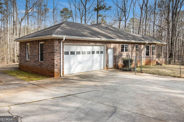 view of side of home with a garage