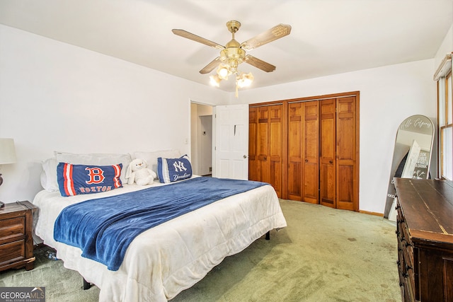 bedroom featuring a closet, ceiling fan, and carpet flooring