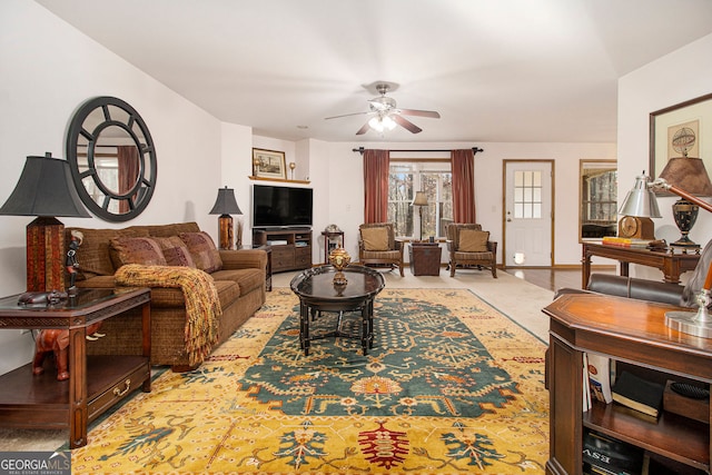 living room with ceiling fan