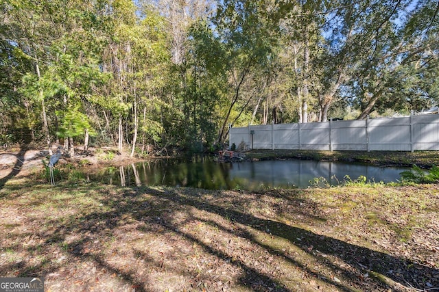 view of yard featuring a water view