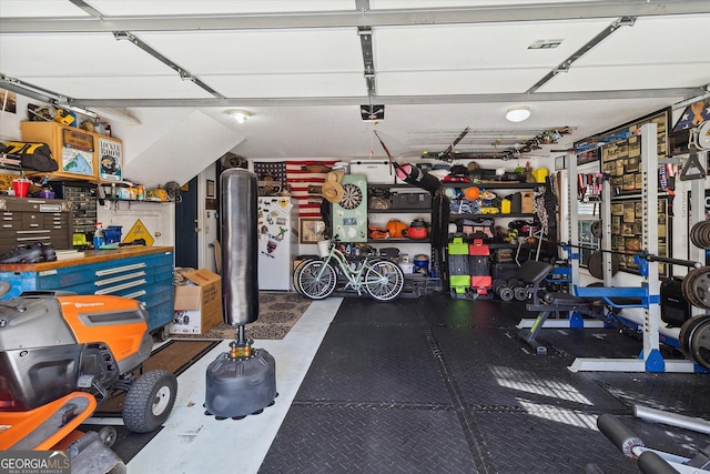 garage with a workshop area