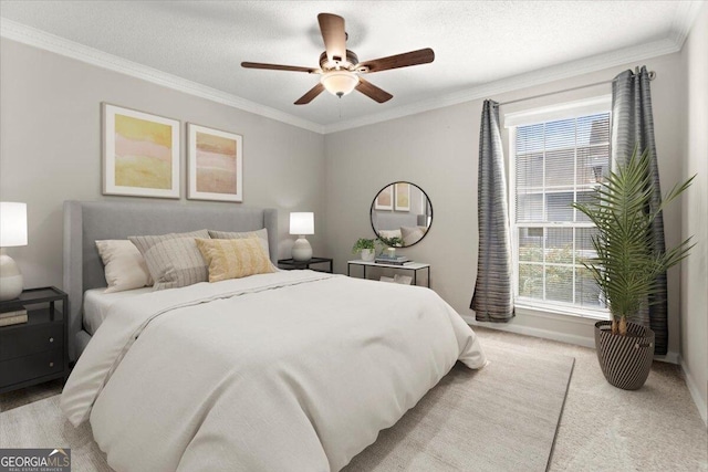 bedroom with ornamental molding, light carpet, ceiling fan, and a textured ceiling