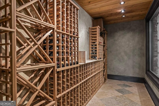 wine cellar featuring wood ceiling