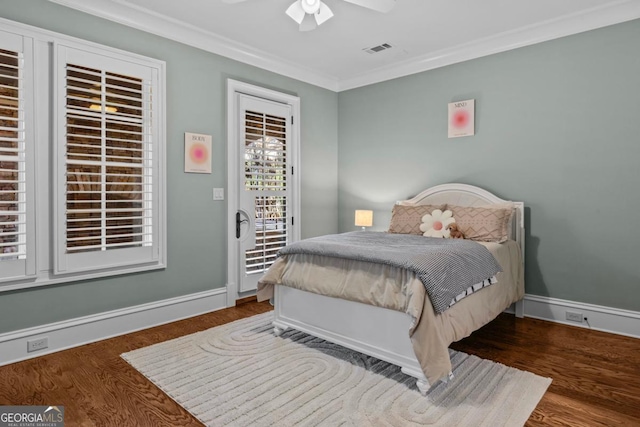 bedroom with ornamental molding, dark hardwood / wood-style floors, access to outside, and ceiling fan