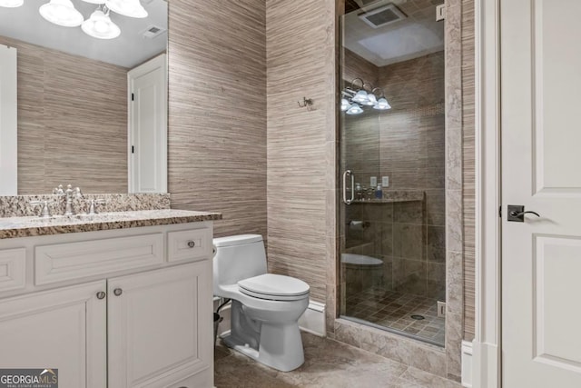 bathroom with toilet, an enclosed shower, tile walls, vanity, and a notable chandelier