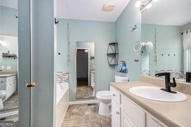 118 Gilberts Way, Temple, GA 30179 - full bath featuring toilet, vanity, a garden tub, a textured ceiling, and baseboards