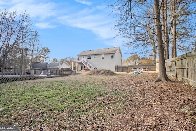 view of yard featuring a trampoline