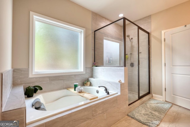 bathroom with independent shower and bath