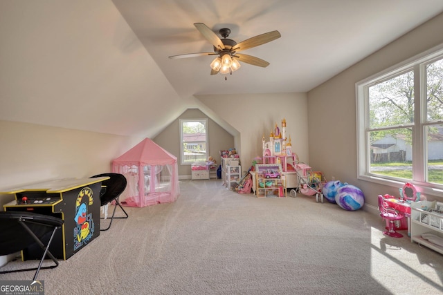 rec room featuring lofted ceiling, carpet floors, and ceiling fan