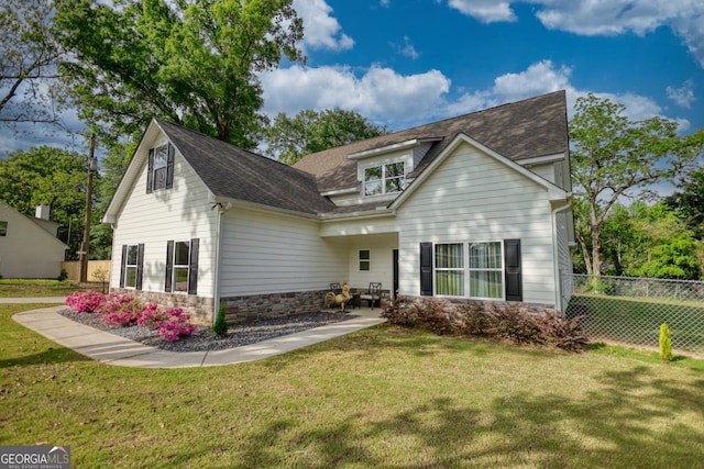 view of front of home with a front yard