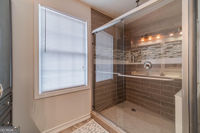 bathroom featuring walk in shower